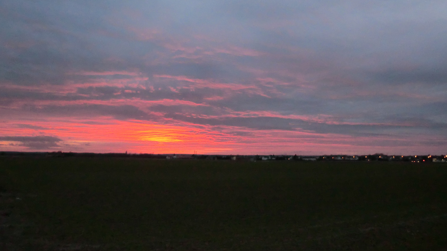 Sonnenuntergang über Rüsselsheim-Bauscheim - Bauscheim unter Feuer